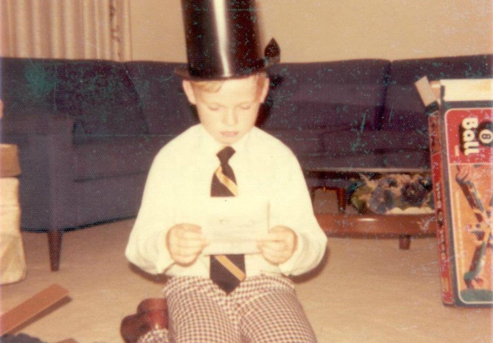 Picture of Brad Brown as a child with a magic set