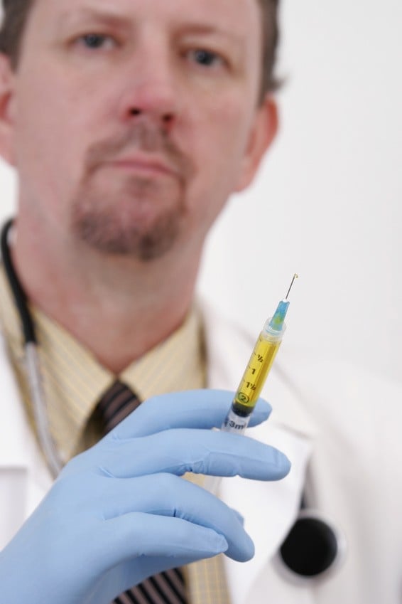 Doctor with a hypodermic needle